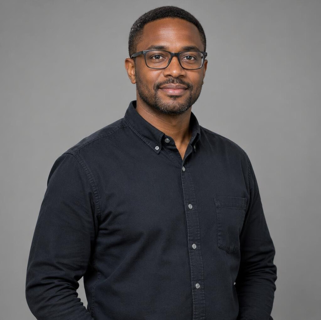 Portrait of a Black man in his late thirties, signal engineer